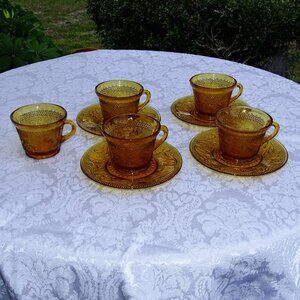 Four Tiara Amber Sandwich Glass Cup and Saucer Sets plus  1 extra cup